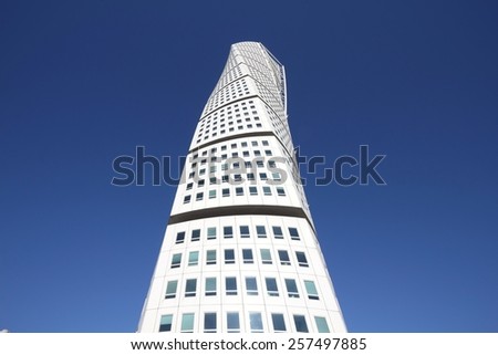 MALMO, SWEDEN - MARCH 8, 2011: Turning Torso skyscraper in Malmo. It was designed by Santiago Calatrava. At 190 meters it is the tallest building of Scandinavia.