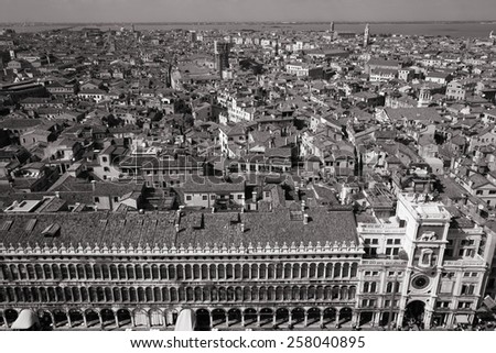 Venice cityscape - famous old city in Italy. Mediterranean Sea in background. Piazza San Marco down there. Black and white retro tone.