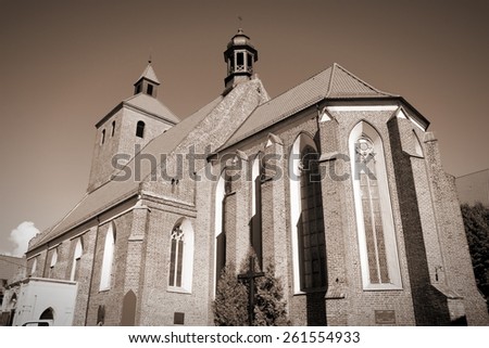 Grudziadz in Pomerania region of Poland. Old church. Sepia tone - retro monochrome color style.