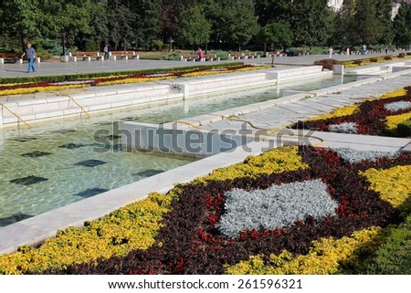 SOFIA, BULGARIA - AUGUST 17, 2012: People stroll in famous NDK park in Sofia, Bulgaria. Sofia is the largest city in Bulgaria and 15th largest in European Union (as of 2012).