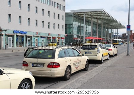 BERLIN, GERMANY - AUGUST 26, 2014: Taxi drivers wait at Ostbahnhof railway station in Berlin. There are some 7,500 taxis in Berlin.