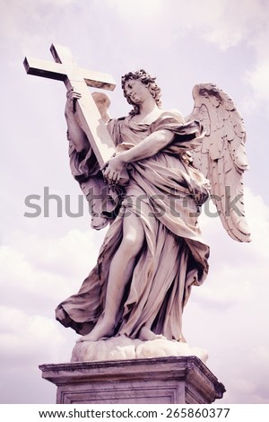 Rome, Italy. Angel sculpture. Cross processed color tone - retro image filtered style.
