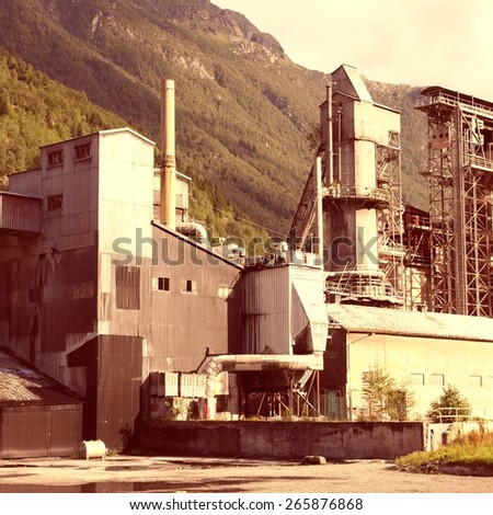 Norway, Hordaland county. Odda steelworks, abandoned industrial factory. Vintage style photo color.