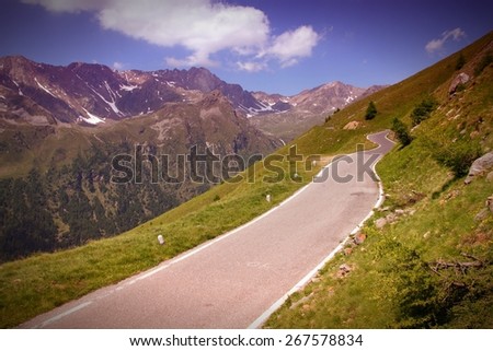 Italy Alps landscape, Stelvio National Park. Road to Gavia Pass in Ortler Alps. Filtered style colors.