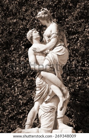 Vienna, Austria - statue of Abduction of Helen (Greek mythology) in Schoenbrunn Gardens, a UNESCO World Heritage Site. Sepia tone - retro monochrome color style.