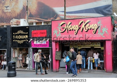 LONDON, UK - MAY 15, 2012: Visitors walk along shops in Camden Town, London. According to TripAdvisor, Camden Town currently is one of top 10 shopping destinations in London.