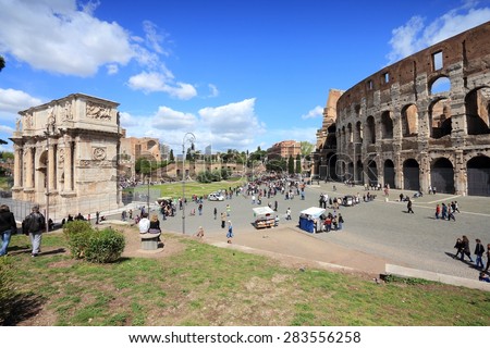 ROME, ITALY - APRIL 8, 2012: People visit Colosseum in Rome. According to official data Rome was visited by 12.6 million people in 2013.