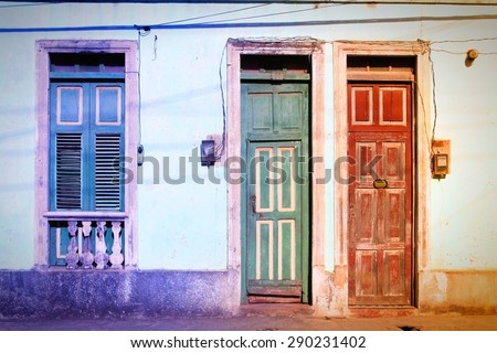 Baracoa, Cuba - colonial architecture. Colorful street view. Filtered colors.