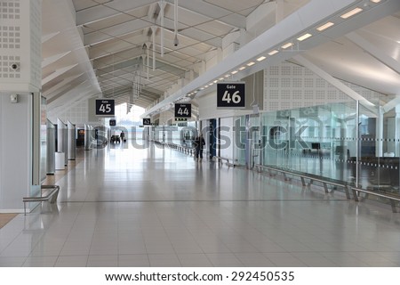 BIRMINGHAM, UK - APRIL 24, 2013: Travelers wait at Birmingham International Airport, UK. With 8.9 million travelers served it was the 7th busiest UK airport in 2012.