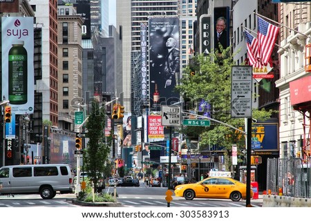 NEW YORK, USA - JULY 4, 2013: People visit Broadway in New York. Almost 19 million people live in New York City metropolitan area.