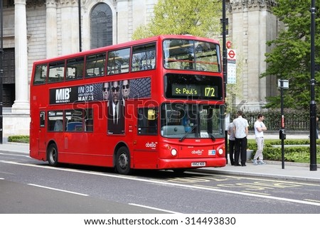 LONDON, UK - MAY 13, 2012: People ride London Bus in London. As of 2012, LB serves 19,000 bus stops with a fleet of 8000 buses. On a weekday 6 million rides are served.