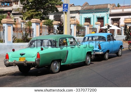 MATANZAS, CUBA - FEBRUARY 22, 2011: Old American cars in Matanzas, Cuba. Cuba has one of the lowest car-per-capita rates (38 per 1000 people in 2008).