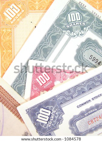 Colorful certificates for common and capital stock shares.