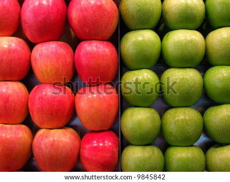 Red and green apples background. Green grocer\'s shopping.