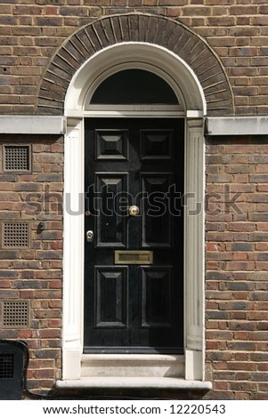 Georgian architecture of London, England - black door in old building
