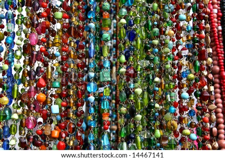 Colorful jewelry beads texture. Outdoor market selection.