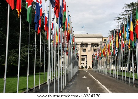 Palace of Nations - seat of the United Nations in Geneva, Switzerland. Flags of all countries.