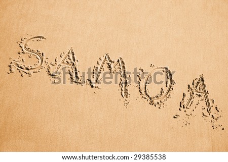 Exotic travel destination - Samoa name written on yellow sand