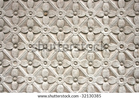 Intricate floral pattern on Amiens cathedral exterior. Architecture detail.