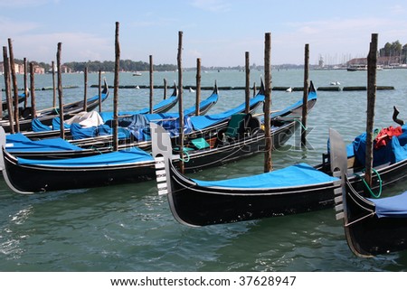 Famous gondolas - passenger transportation boats typical for Venice, Italy