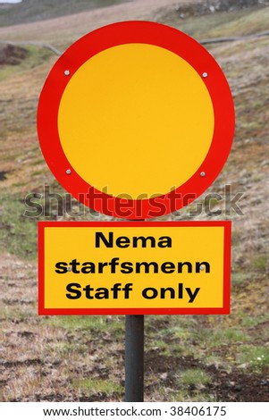 Road sign in English and Icelandic language - staff only, no entry