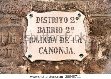 Vintage street sign in Barcelona, Spain. Old architecture detail.
