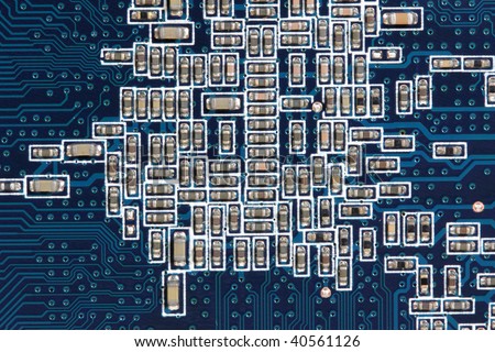 Modern electronic circuit board full of small capacitors. Electronics industry.