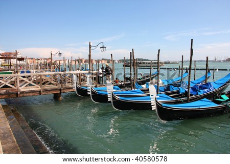 Famous gondolas - passenger transportation boats typical for Venice, Italy