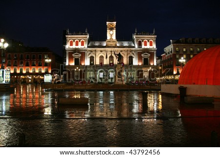 Casa Consistorial - beautiful town hall in Valladolid, Spain. Night view in rainy weather.