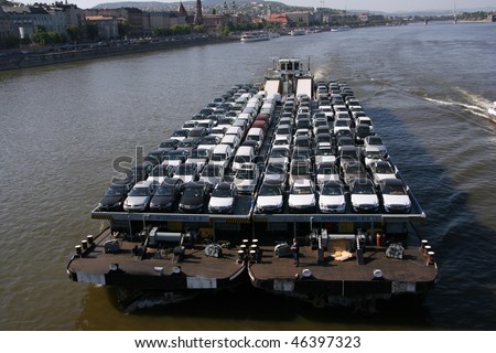 BUDAPEST - MAY 2: Shipping barge full of Renault and Mercedes cars on May 2, 2007 in Budapest, Hungary. Danube River, designated as Corridor 7 is an important nautical transportation route.