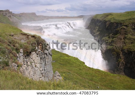 Iceland. Gullfoss falls in area called Golden Circle. Rainbow on river Hvita. Famous waterfall.