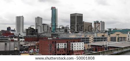Birmingham skyline panorama with modern office buildings seen from Digbeth. West Midlands, England. Rainy day.