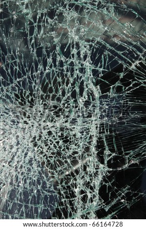 Broken car windshield made of laminated glass