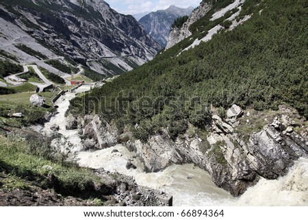 Italy, Stelvio National Park. Famous road to Stelvio Pass in Ortler Alps. Alpine landscape.