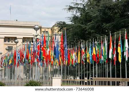 Palace of Nations - seat of the United Nations in Geneva, Switzerland. Flags of all countries.