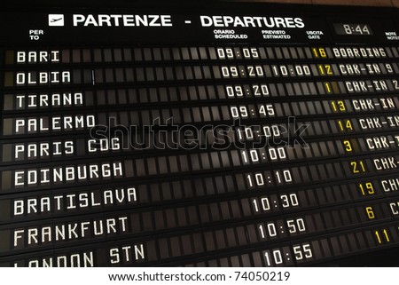 Departure schedule at an airport in Italy. Flights to Bari, Olbia, Tirana, Palermo, Paris, Edinburgh, Bratislava and Frankfurt.