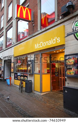 COPENHAGEN - MARCH 10: McDonald\'s restaurant on March 10, 2011 in Copenhagen, Denmark. With 4.9bn USD announced net income (2010) it is the top fast food chain worldwide.