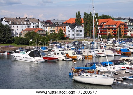 http://image.shutterstock.com/display_pic_with_logo/56934/56934,1302826644,1/stock-photo-kristiansand-norway-capital-of-vest-agder-county-luxury-yachts-in-marina-75280579.jpg