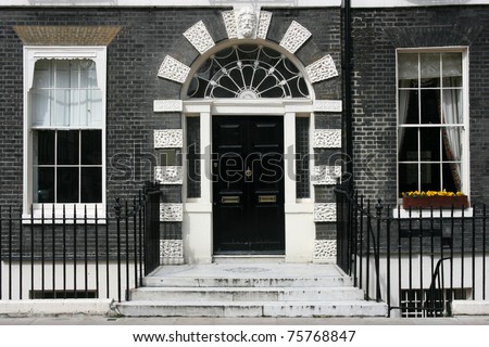 Georgian architecture of London, England - black door in old building
