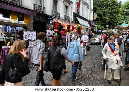 PARIS - JULY 22: Tourists at Rue de Steinkerque on July 22, 2011 in Paris, France. The street is one of most famous shopping areas in Monmartre district. Paris is the most visited city worldwide.