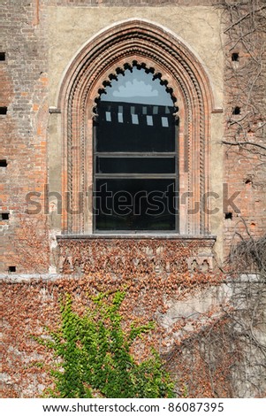 Milan, Italy. Castello Sforzesco (Sforza Castle) window - old landmark of Lombardy.