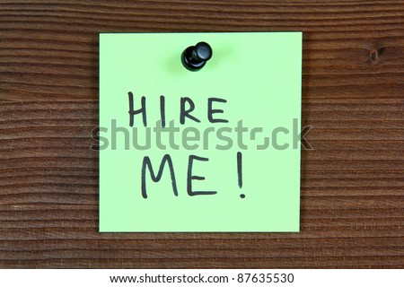 Sticky note with employment message - hire me. Unemployment concept, job search. Bulletin board.
