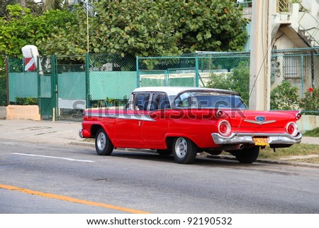 HAVANA - FEBRUARY 24: Classic American Ford car on February 24, 2011 in Havana. Recent law change allows Cubans to trade cars again. Old law resulted in very old fleet of private owned cars in Cuba