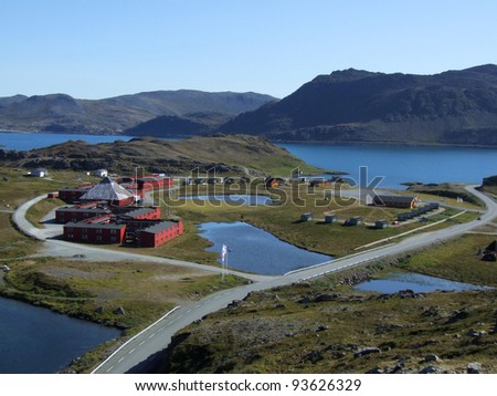 Norway landscape - road and town on Mageroya island. Road to Nordkapp (North Cape).