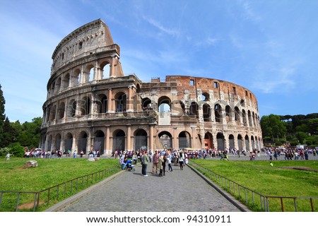 ROME - MAY 9: Tourists visit the Colosseum on May 9, 2010 in Rome, Italy. According to Euromonitor\'s Destination Ranking, Rome is the 3rd most visited city in Europe (5.5m int\'l tourist arrivals 2009)