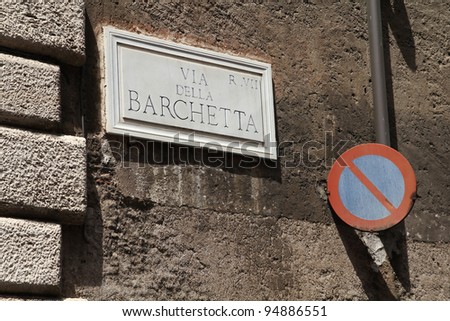 Via Barchetta - street sign in Rome, Italy. Regola district. No parking sign.