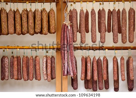 Many dried sausage at the butcherÃ?Â´s.