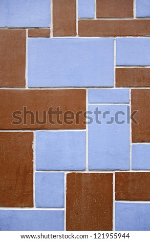 Brick wall blue and red detail front facade in the city, decoration