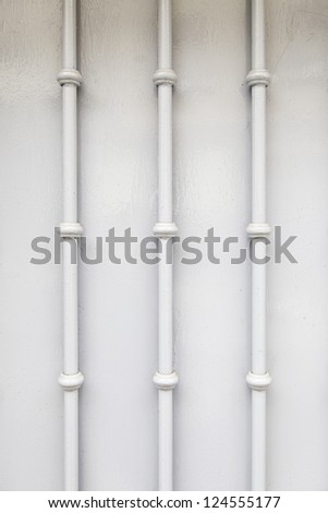 Wall with metal bars, facade detail, protection