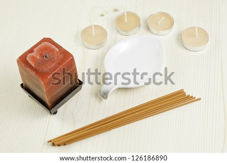Scented candles and incense sticks, detail of zen relaxation, aromatherapy